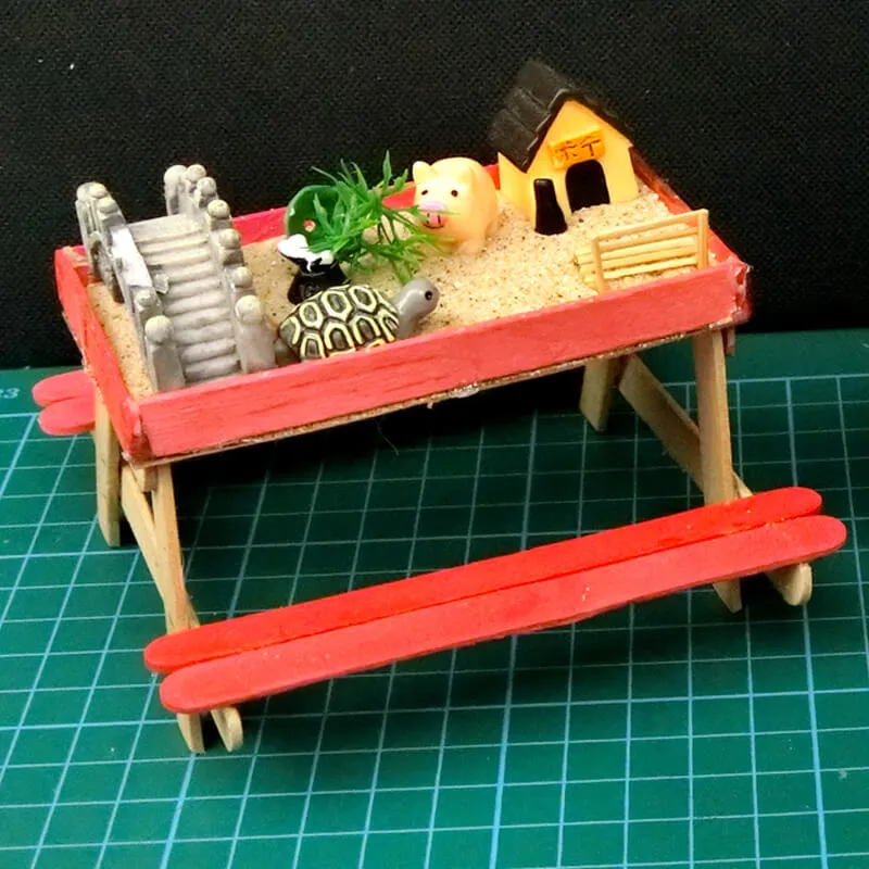16 popsicle stick table sandpit 17